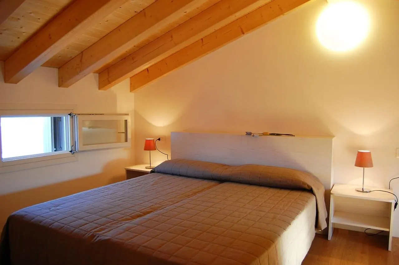 Homely Apartment With Swimming Pool In A Village Bibione
